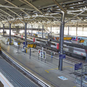 Wide view of platforms and trains at Leeds train station