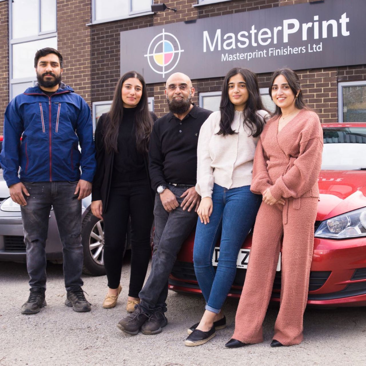 The team from Masterprint Packaging stood outside an office