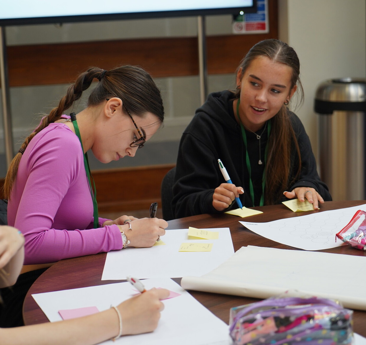 Children working at school, making posters 