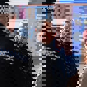 Police officer speaking to members of public