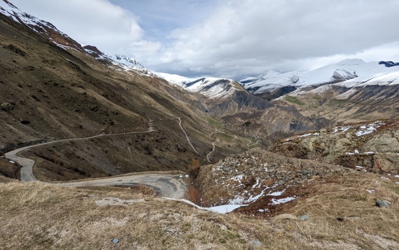 view of a landscape with roads leading to the mountains
