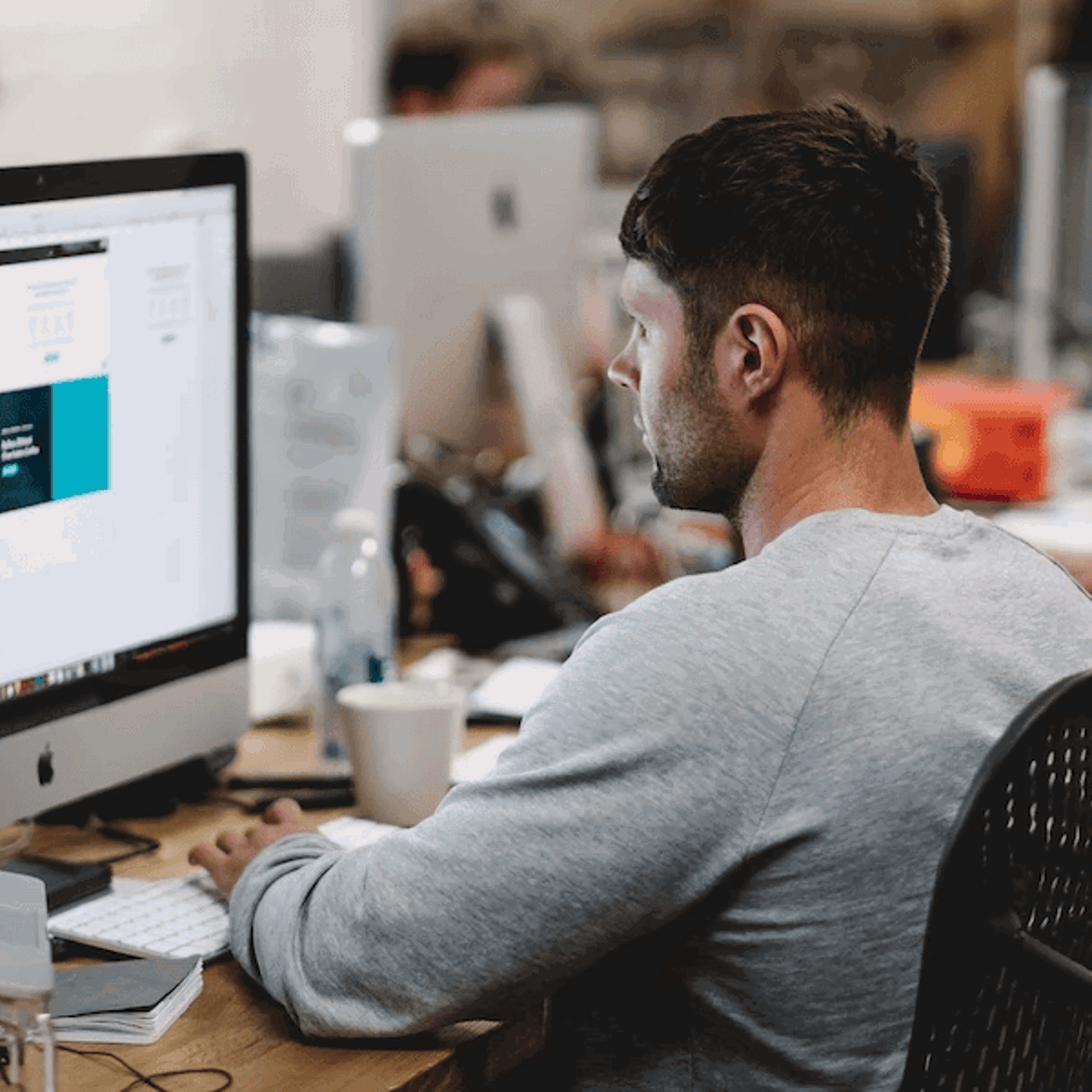 apprentice working at computer