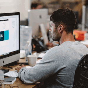 apprentice working at computer