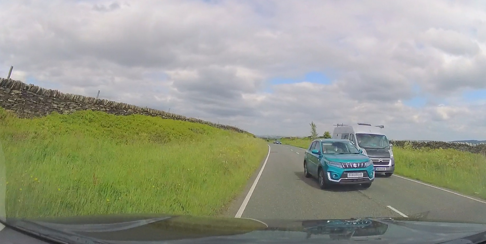Dash Cam Footage of a car overtaking on a road