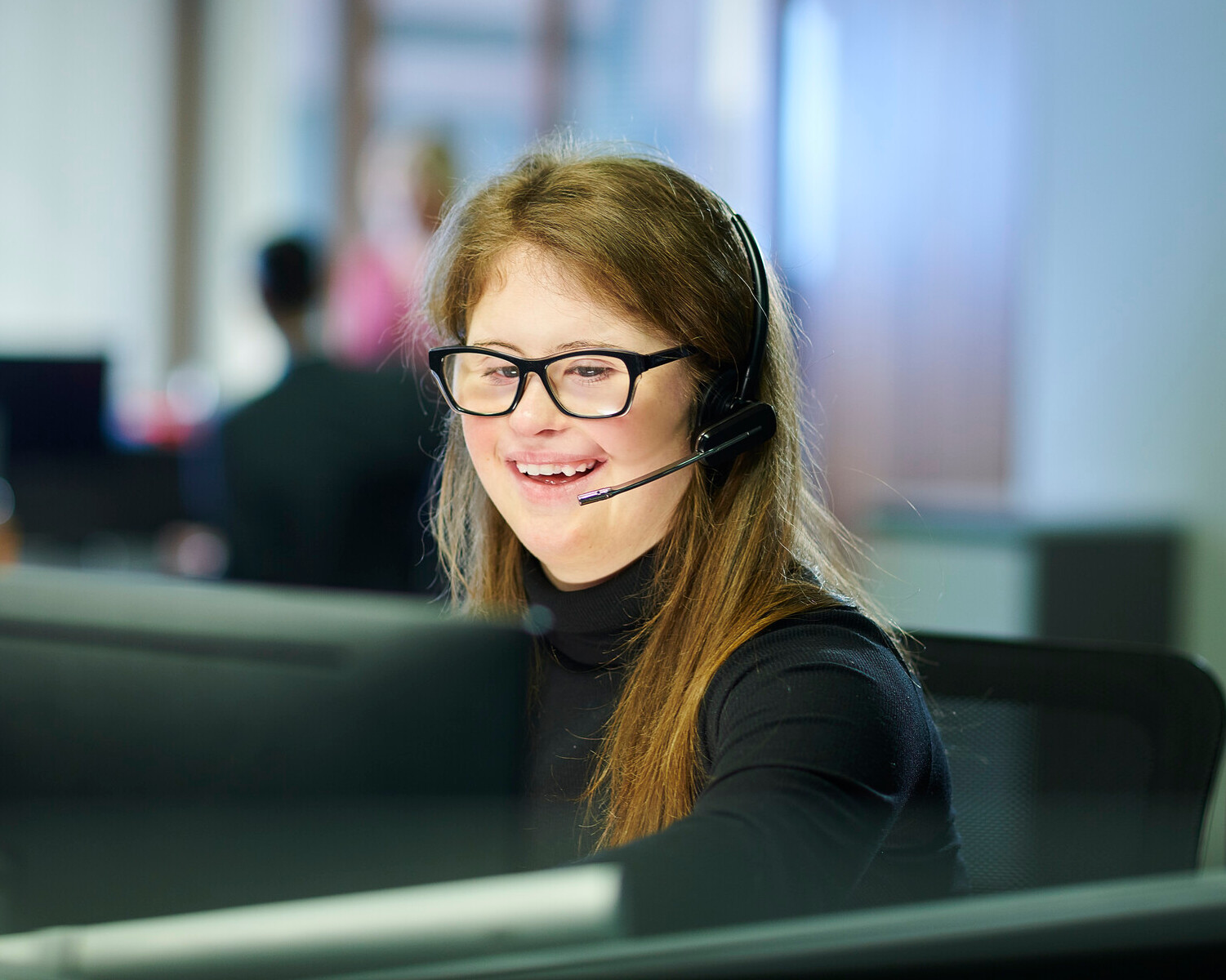 Call centre colleague wearing a headset