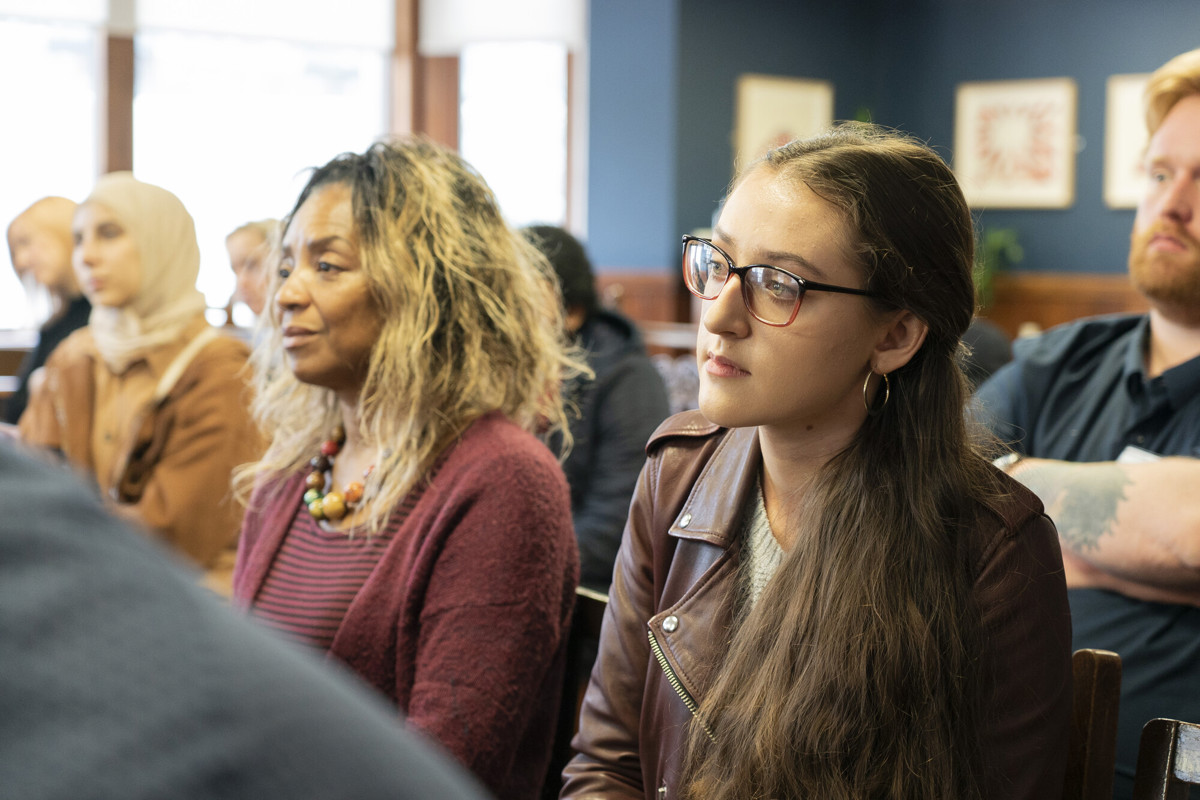 Delegates listening to talk at graduate event