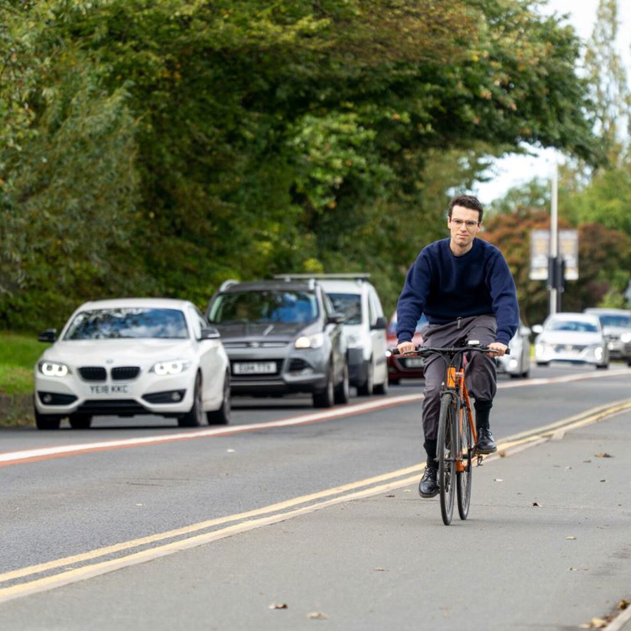 A cyclist in a cycle lane in Leeds